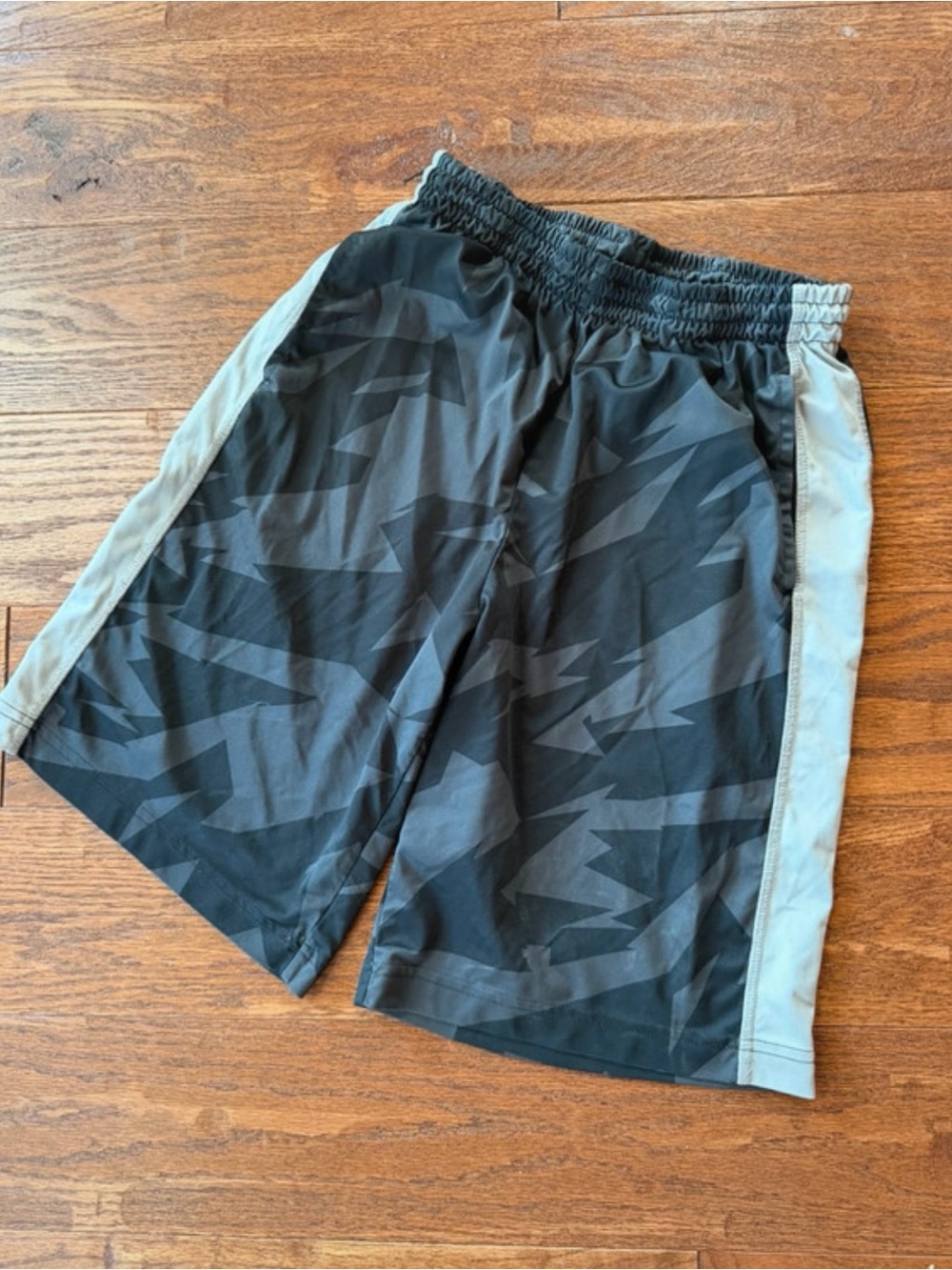 Nike Men's Black Athletic Shorts with Gray Side Panels